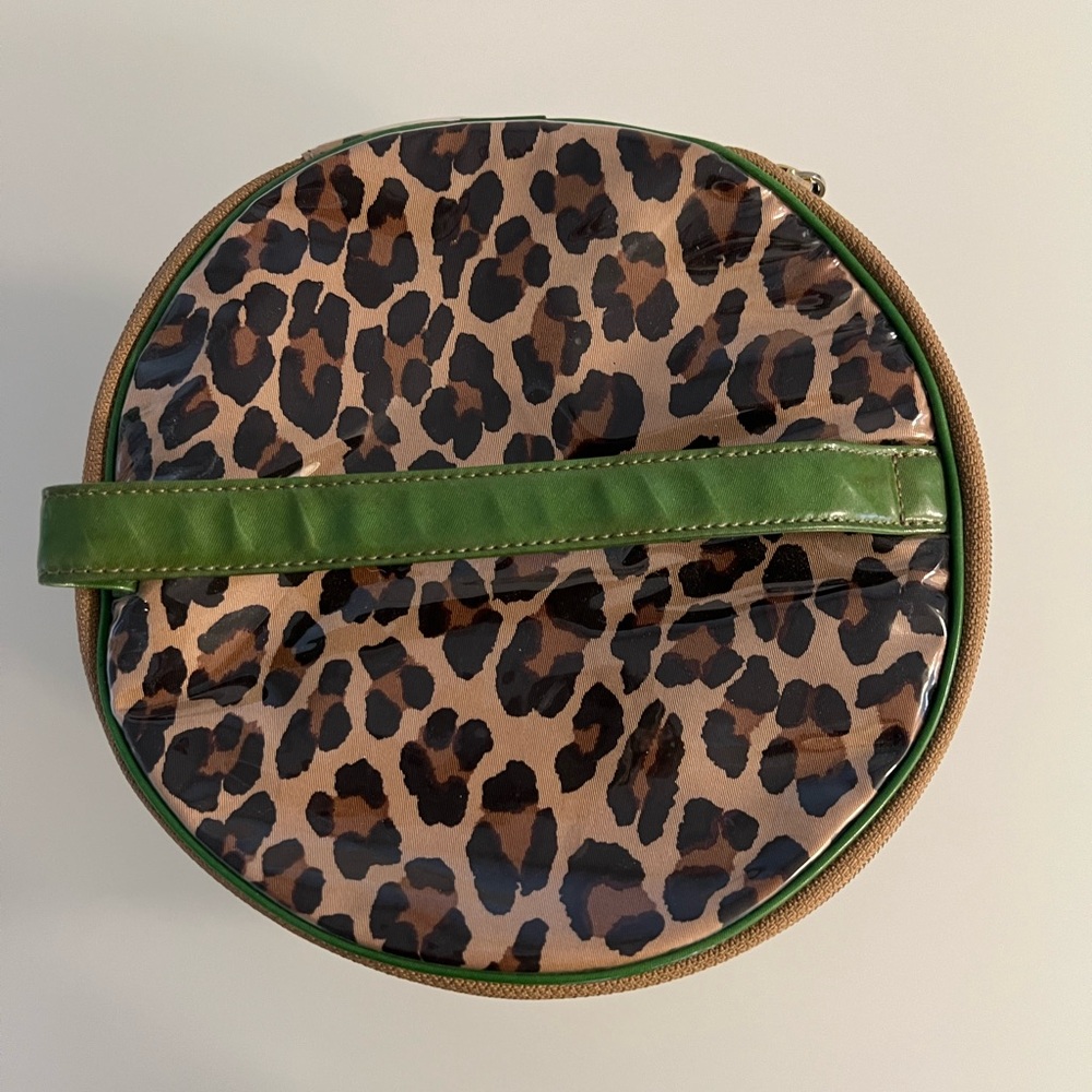 Kate Spade cosmetic bag. Rare shape. Leopard print & green lining/trim.
